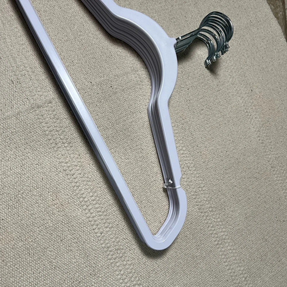 🏡NWOT A dozen ( 12 units ) of Slim silver hook hangers